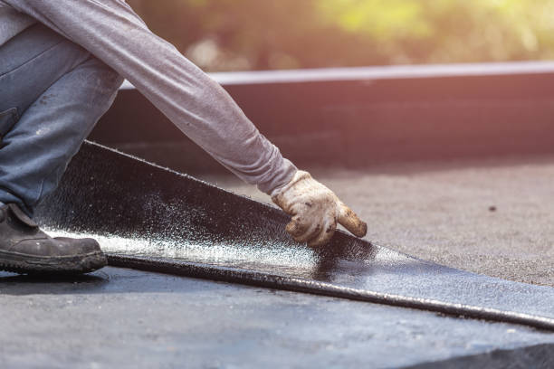 Professional Emergency Waterproofing technician working in Abingdon, IL
